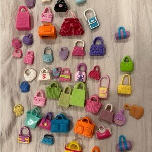 Lot of Polly pocket Handbags